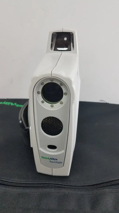 White plastic welch allyn suresight handheld vision screener with black circular lenses and textured grip for eye screening