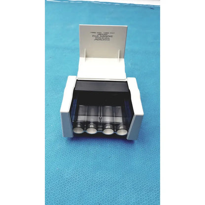 Welch Allyn Universal KleenSpec single use specula dispenser in white plastic with four transparent cylindrical compartments