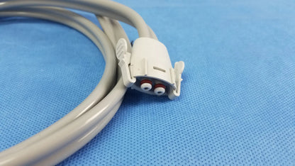 Gray medical cable with white plastic connector and two red circular ports for welch allyn vital signs and blood pressure cuffs