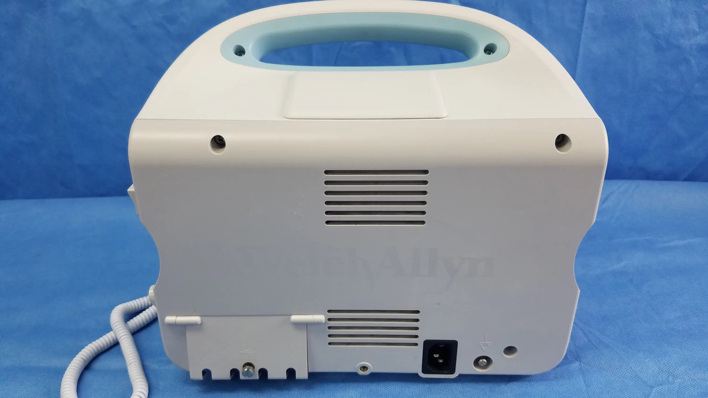 White welch allyn vital signs monitor 6000 series with light blue handle, ventilation slits, power port, and blood pressure cuff cables