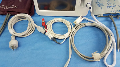 White Welch Allyn Vital Signs Monitor 6000 Series with integrated display, connected cables, and Criticon blood pressure cuffs