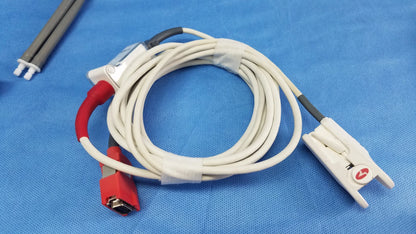 White coiled medical cable with red and gray connectors and clip-on electrode for welch allyn vital signs monitor 6000 series blood pressure use