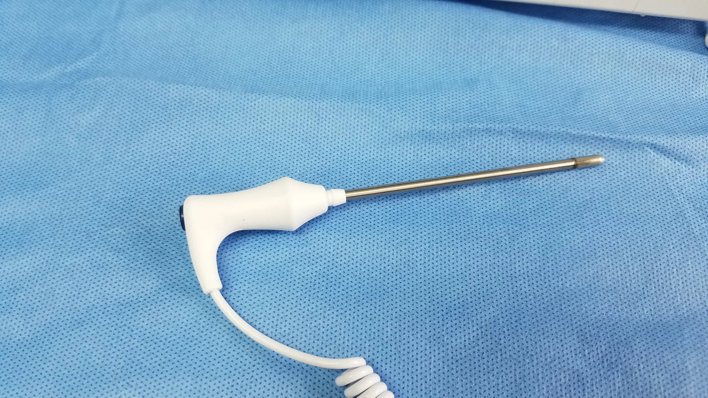 White plastic-handled surgical instrument with metallic coiled cable and slender metal probe for vital signs and blood pressure measurements