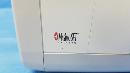 White masimo set rainbow medical vital signs monitor with blood pressure cuffs and red black logo on side for blood pressure
