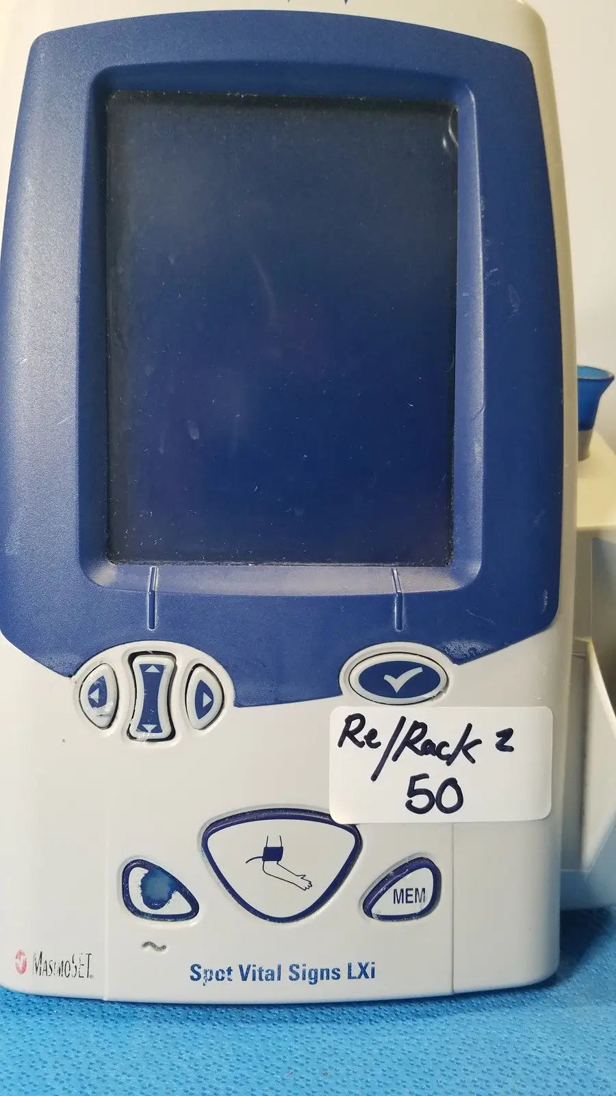 Blue and white spot vital signs lxi medical monitor with control buttons and sticker front for welch mismo set allyn spot use