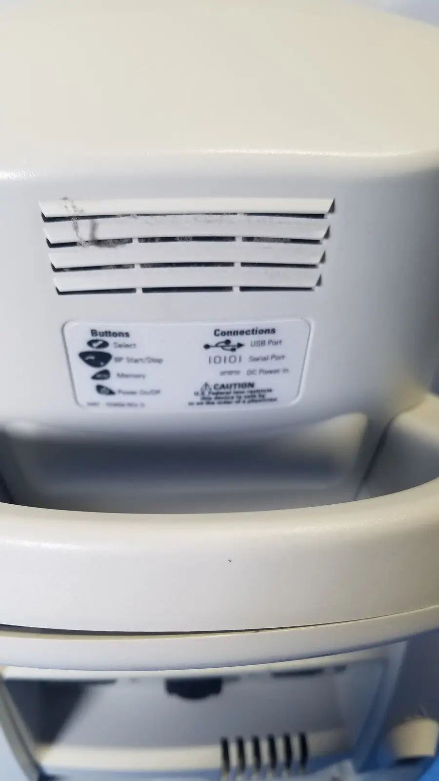 White plastic microwave with vented back panel and labeled control buttons for welch mismo set allyn spot monitor
