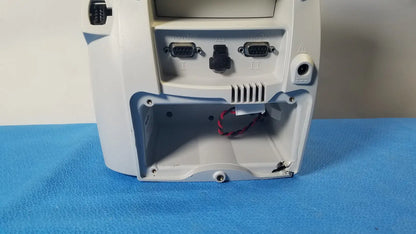 White plastic back side of welch mismo set allyn spot vital signs patient monitor with two db9 ports and open panel