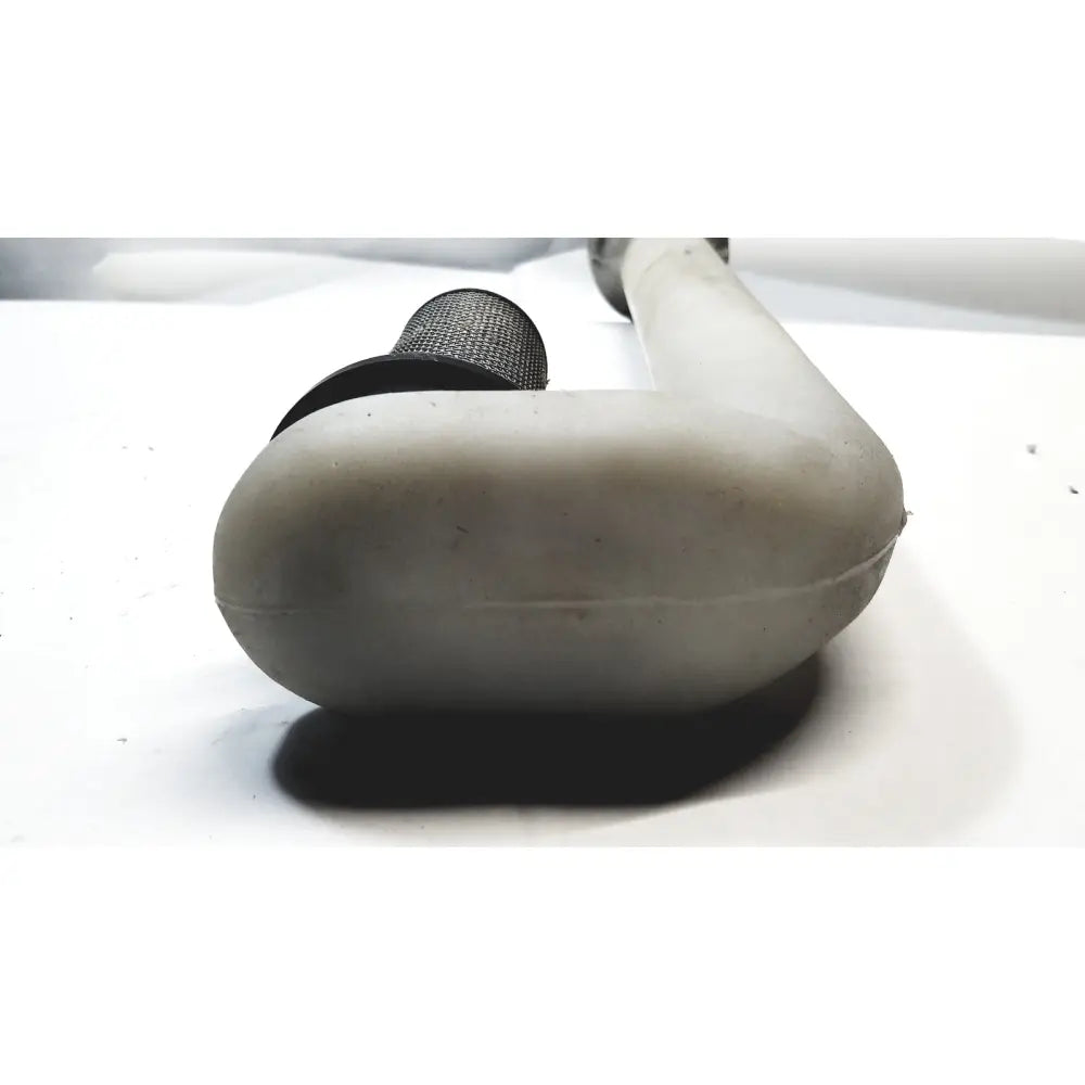 Gray plastic elbow with black mesh cap attached to white plastic hose pipe with filter for water flow control