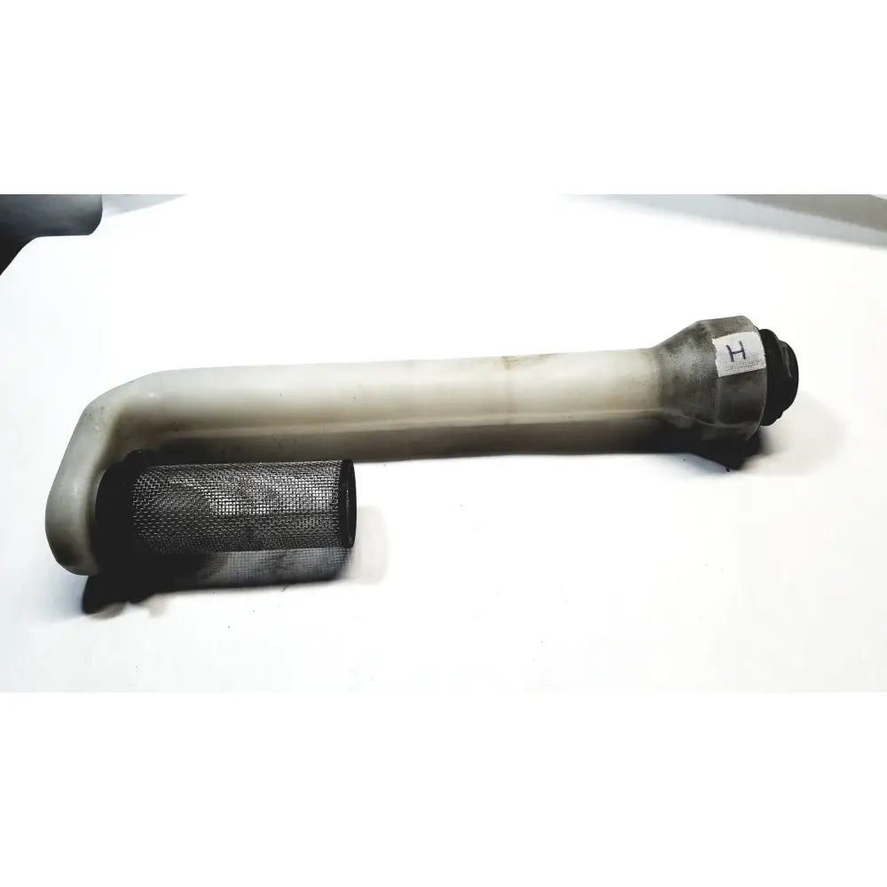 White plastic hose pipe with gray plastic hose, black mesh filter, and metal fitting capped at one end for filtration use