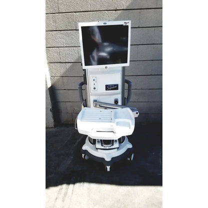 White medical ultrasound machine with mounted screen and adjustable tray showcasing whitestar signature phacoemulsifier