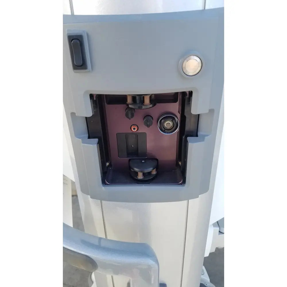 Gray plastic whitestar signature phacoemulsifier atm machine with metallic interior components and circular button
