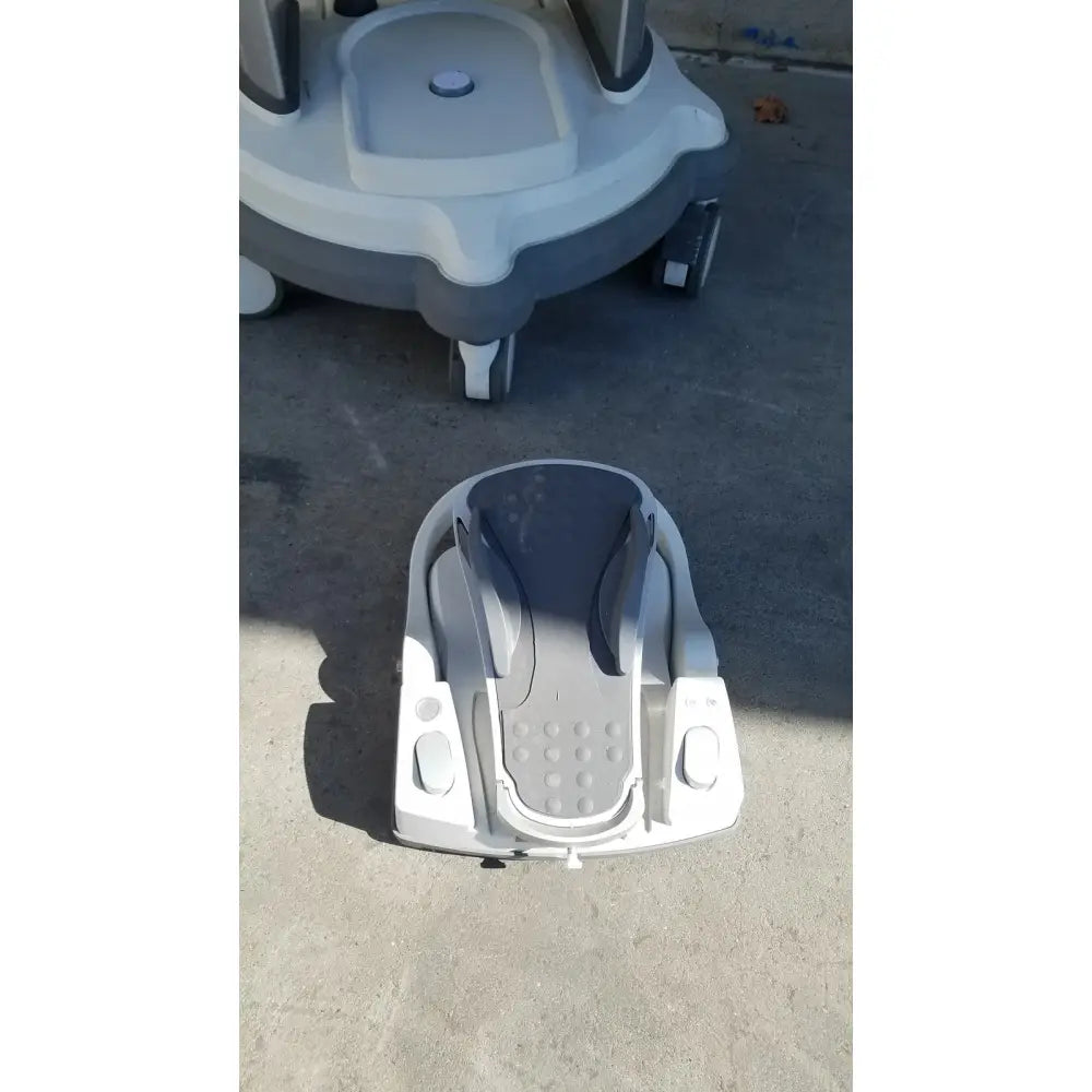 Gray and black plastic baby walker with textured footpad for footswitch in whitestar signature phacoemulsifier reuse medical