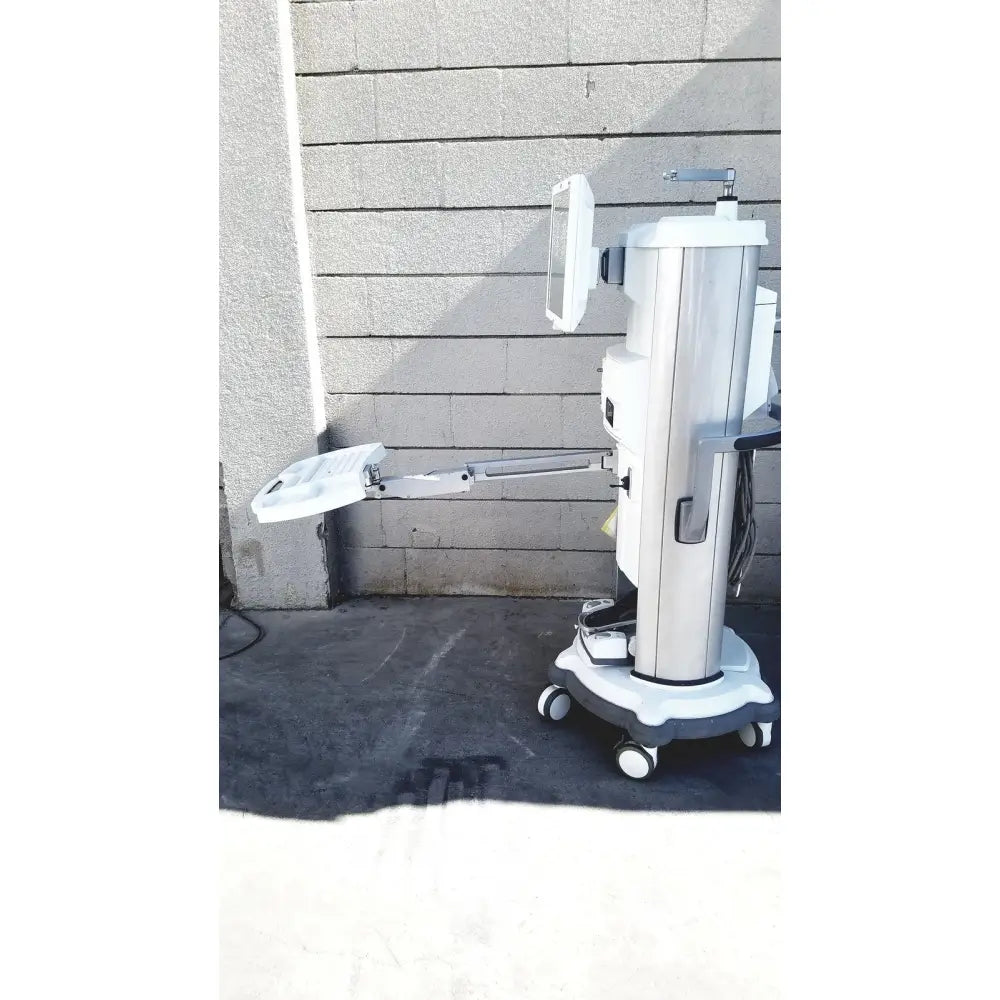 White and gray medical-grade ophthalmic whitestar signature phacoemulsifier with articulated arm and monitor for reuse medical use