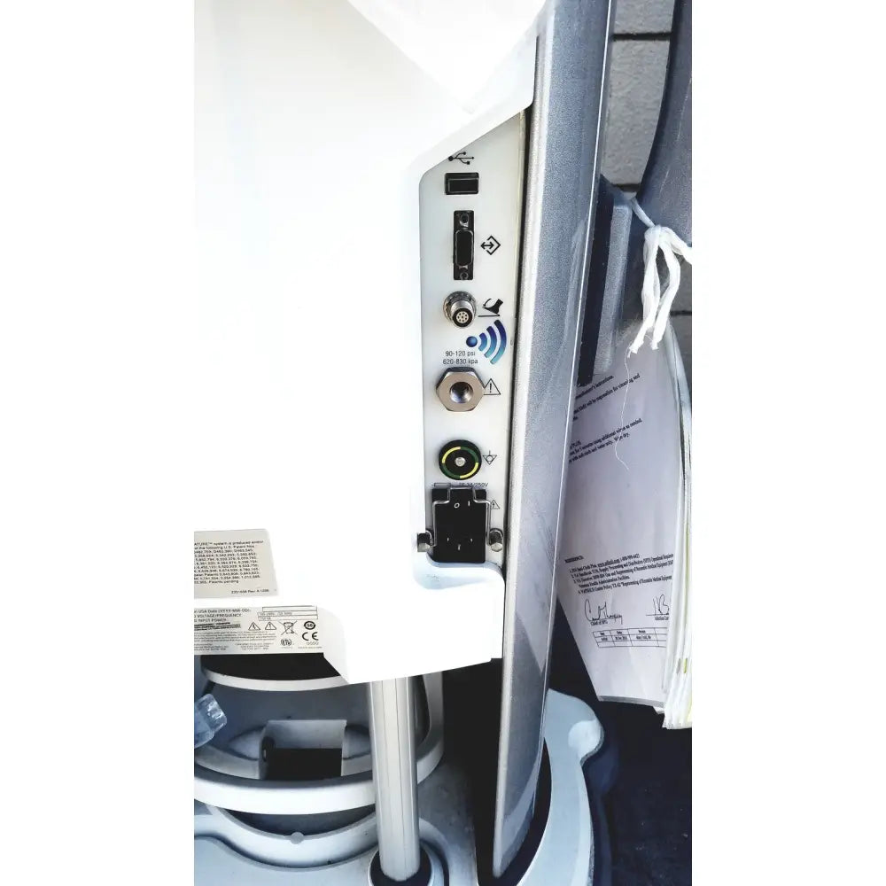 White medical imaging device showing side panel with multiple ports and connectors for whitestar signature phacoemulsifier reuse medical use