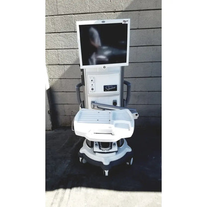 White and gray mobile medical imaging unit with monitor and whitestar signature logo for whitestar signature phacoemulsifier