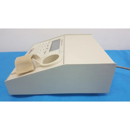 Beige plastic williams 6100 ultrasound therapeutic device with digital display and control panel for clinical use
