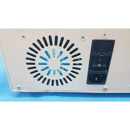 White plastic power supply unit with black grille and switch panel on the back of williams 6100 ultrasound therapeutic device