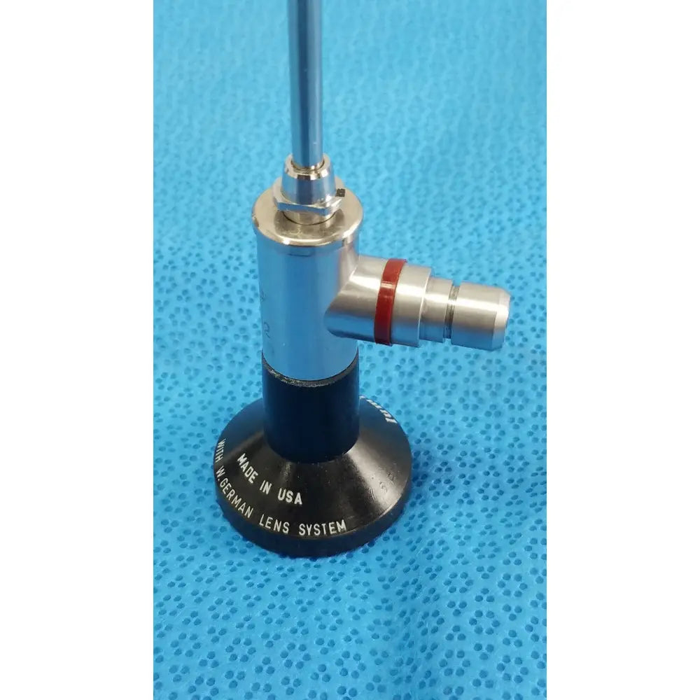 Silver and black WOLF 8471.42 25° arthroscopy endoscope orthopedic with red band and made in USA label on base