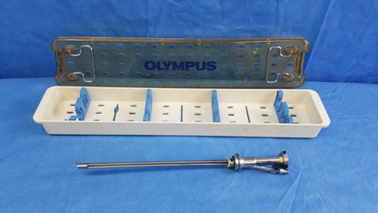 Working insert hystero-resectoscope with olympus sterilization tray and metallic endoscopic instrument on table