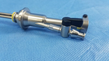 Stainless steel working insert hystero-resectoscope with black handle yellow accent in olympus sterilization tray endoscopic instrument