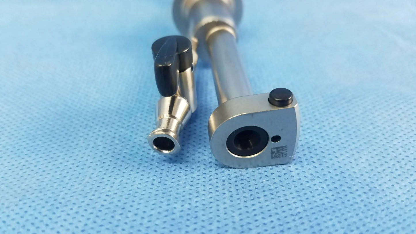Silver working insert hystero-resectoscope with black handles and qr code on base in olympus sterilization tray endoscopic instrument