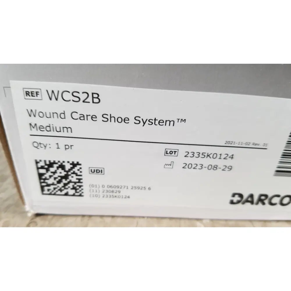 Darco wcs2b medium wound care shoe open-toe system in white packaging with black text and barcode ref wcs2b back side