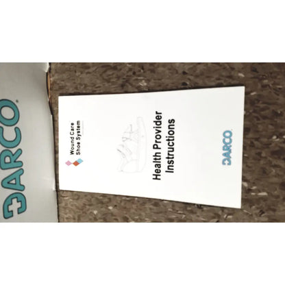 White paper insert labeled health provider instructions for darco wound care shoe system small wound care shoe