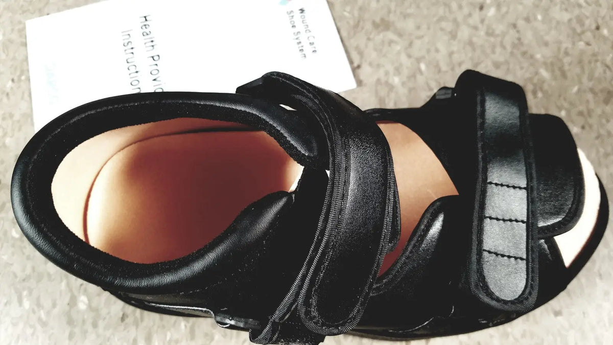 Black leather wound care shoe system small with adjustable velcro straps and padded insole for reuse medical use