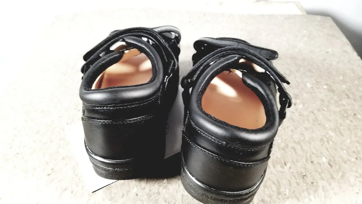 Black leather wound care shoe small with velcro straps and padded insole for reuse medical support