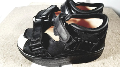 Black orthopedic wound care shoe small with thick platform sole and adjustable velcro straps for wound care