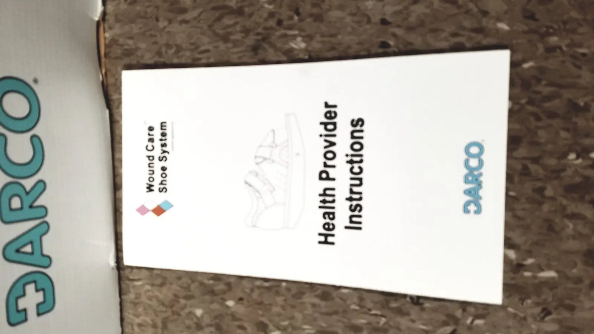 White paper insert labeled health provider instructions for darco wound care shoe system small wound care shoe