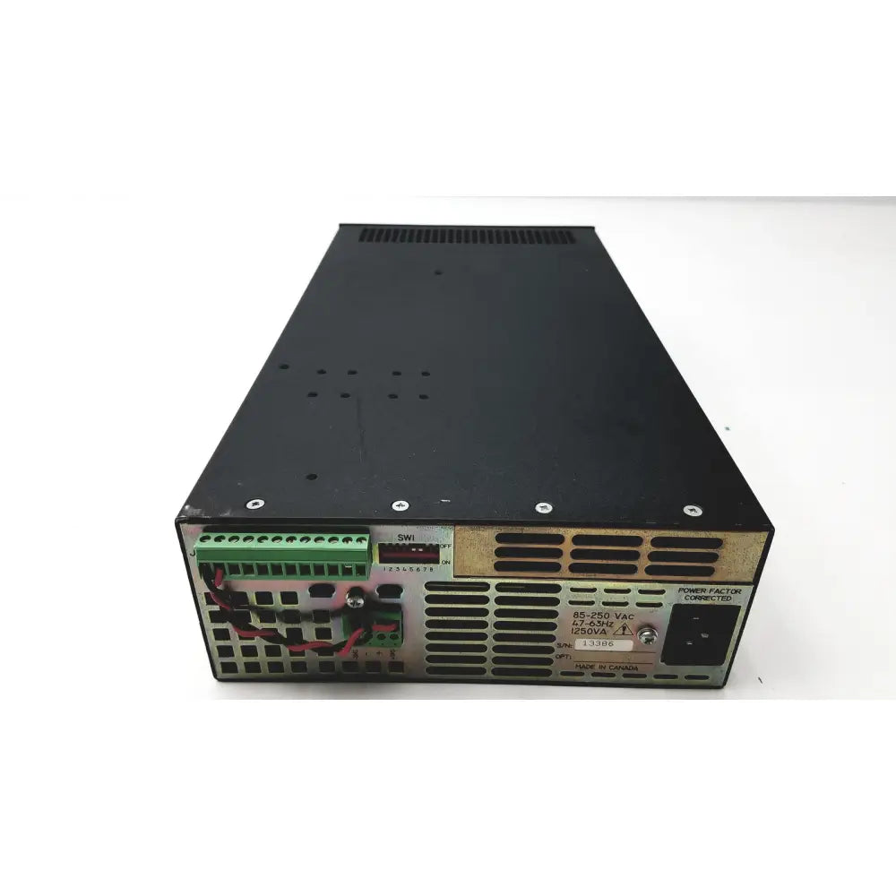 Black Xantrex xhr 60-10 industrial power supply single output with green terminal block and ventilation grilles