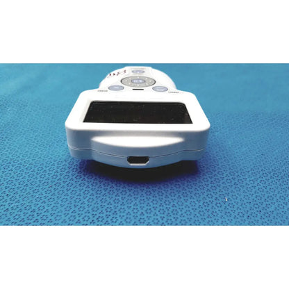 White plastic handheld xavant technology stimpod nms 450 transmission monitor with rectangular screen and circular buttons