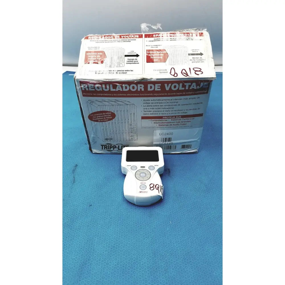 White plastic voltage regulator controller with digital display and circular buttons for xavant technology stimpod nms 450 transmission monitor