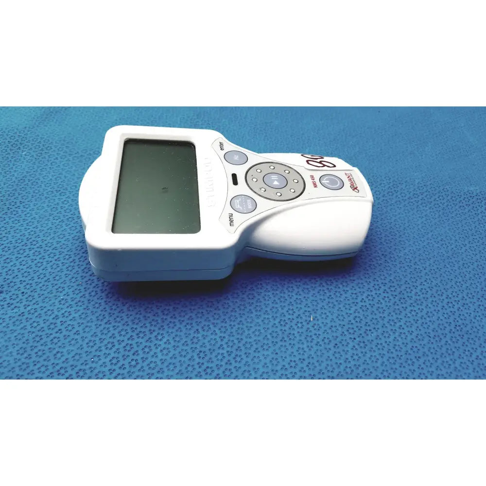 White handheld glucose meter with rectangular screen and circular buttons from xavant technology stimpod nms 450 transmission monitor