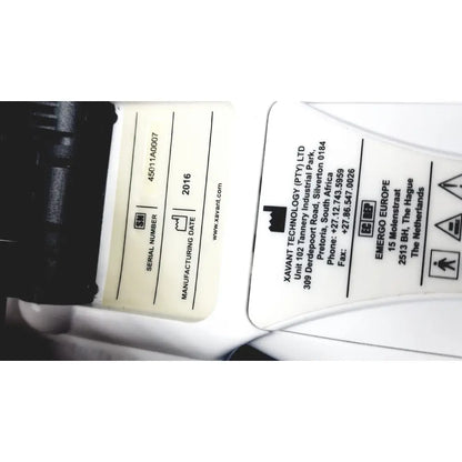 White plastic label with black text showing serial number 45011a0007 and 2016 date on xavant technology stimpod nms monitor
