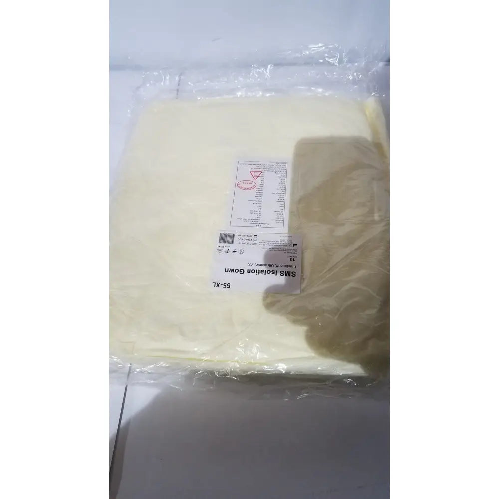 A pale yellow xiantao 55-xl sms isolation gown with elastic cuff packaged in clear plastic for medical use