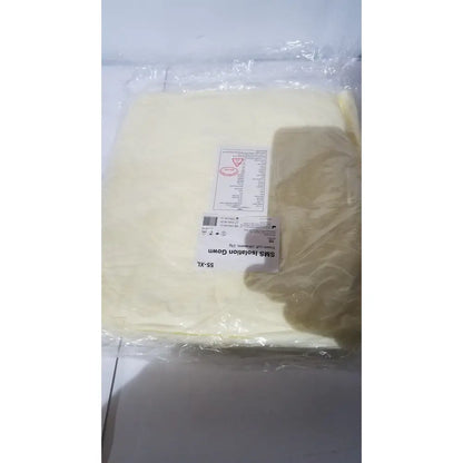 A pale yellow xiantao 55-xl sms isolation gown with elastic cuff packaged in clear plastic for medical use