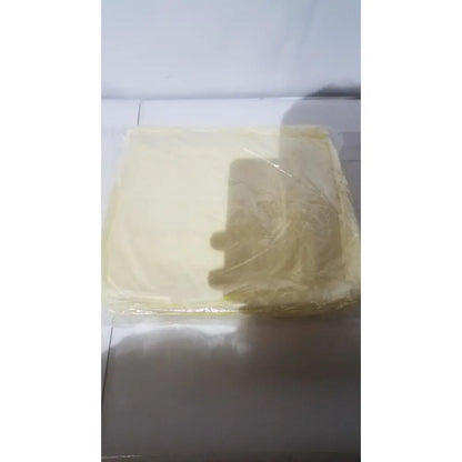 A translucent yellow plastic-wrapped rectangular block shown with xiantao 55-xl sms isolation gown packaging