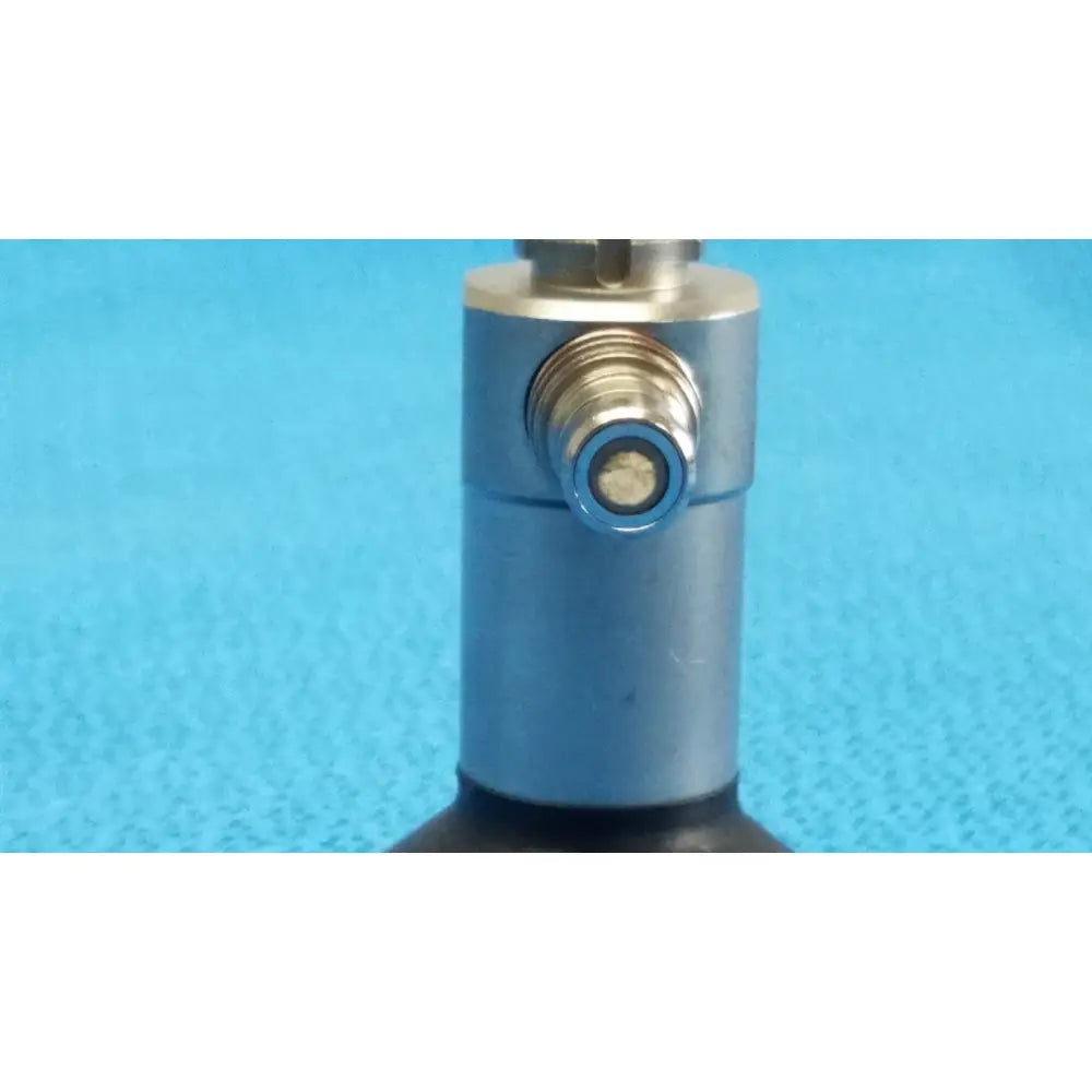 Silver cylindrical air compressor valve with threaded connection and black rubber base for xomed sharpsite 30° autoclavable endoscope