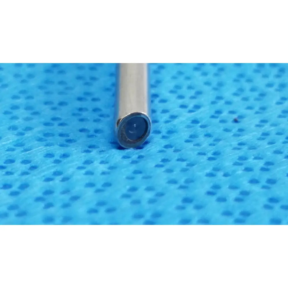 A sleek metallic cylindrical xomed sharpsite autoclavable endoscope lens with a dark circular aperture 30° angle