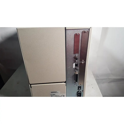 Beige textured industrial zebra 105sl plus usb ethernet thermal transfer label printer with vertical port panel back view