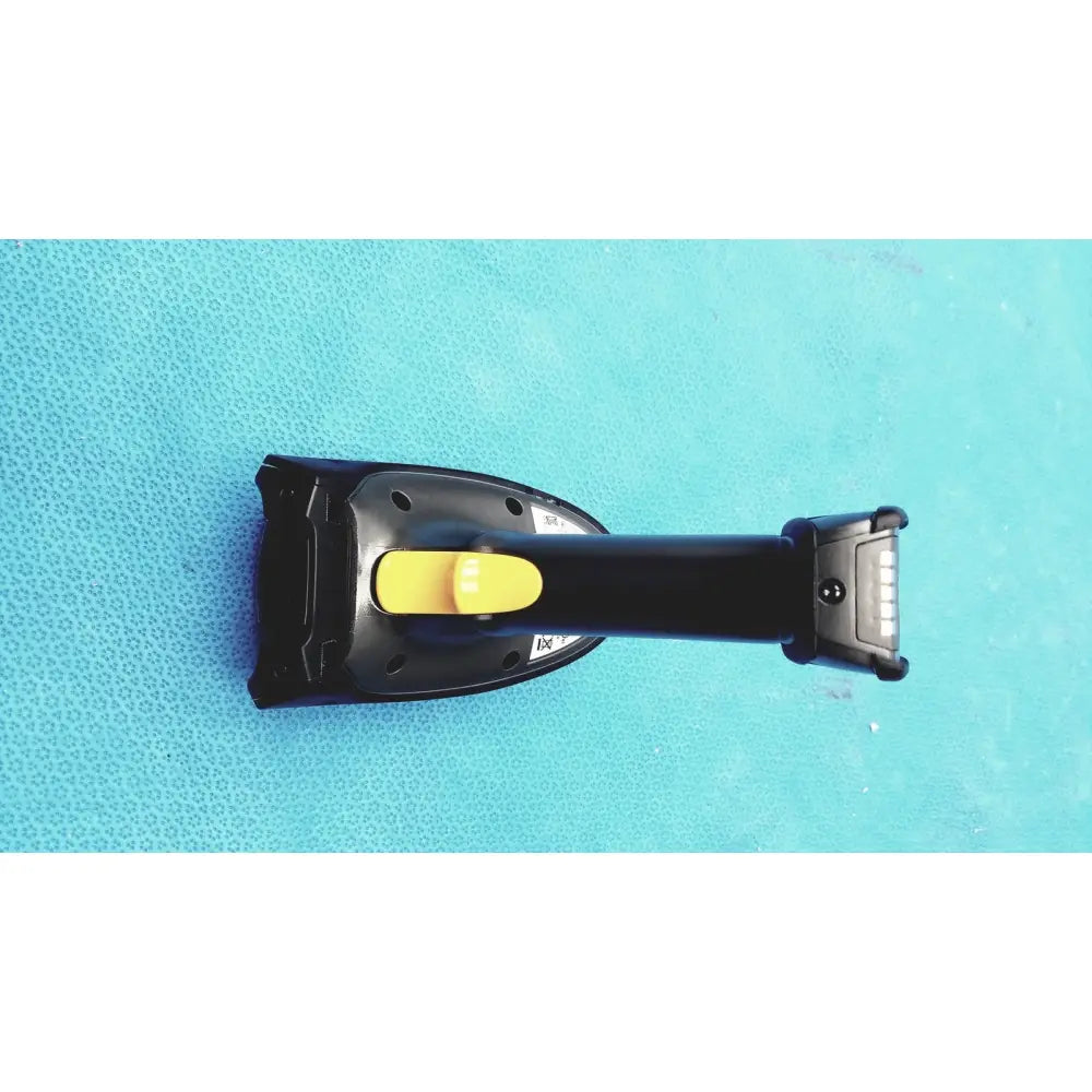 Black handheld zebra barcode scanner mt2070-sd4d62370wr with bright yellow trigger button and battery charger