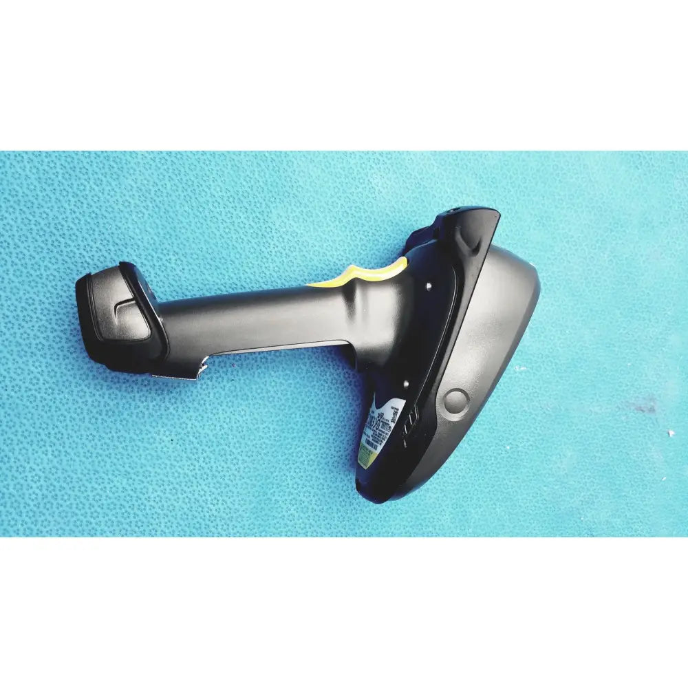 Black zebra barcode scanner mt2070-sd4d62370wr with yellow grip accent and battery charger for handheld use