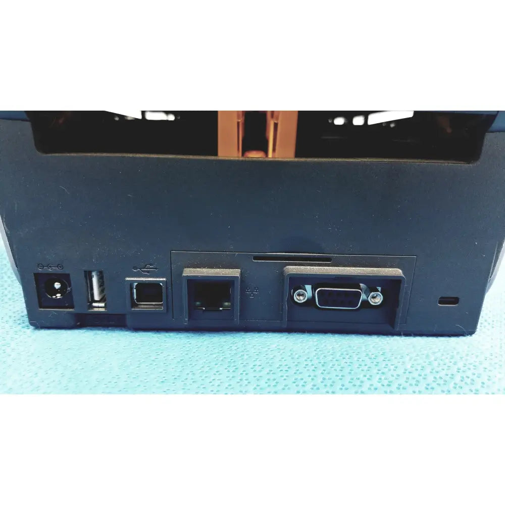 Black plastic zebra zd620 thermal transfer desktop label printer back with power usb ethernet and vga ports