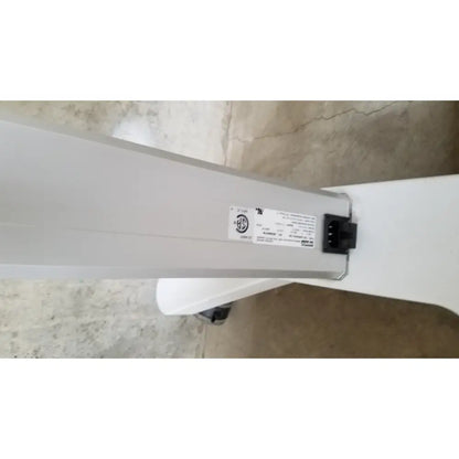 White plastic power adapter with black connector and label for zeiss humphrey visual field analyzer model 740 back side