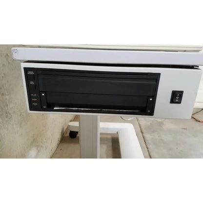 White Zeiss Humphrey visual field analyzer model 740 with black paper tray and control panel for eye examinations