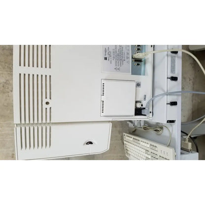 White plastic Zeiss Humphrey visual field analyzer model 740 printer with vertical vents and front compartment panel