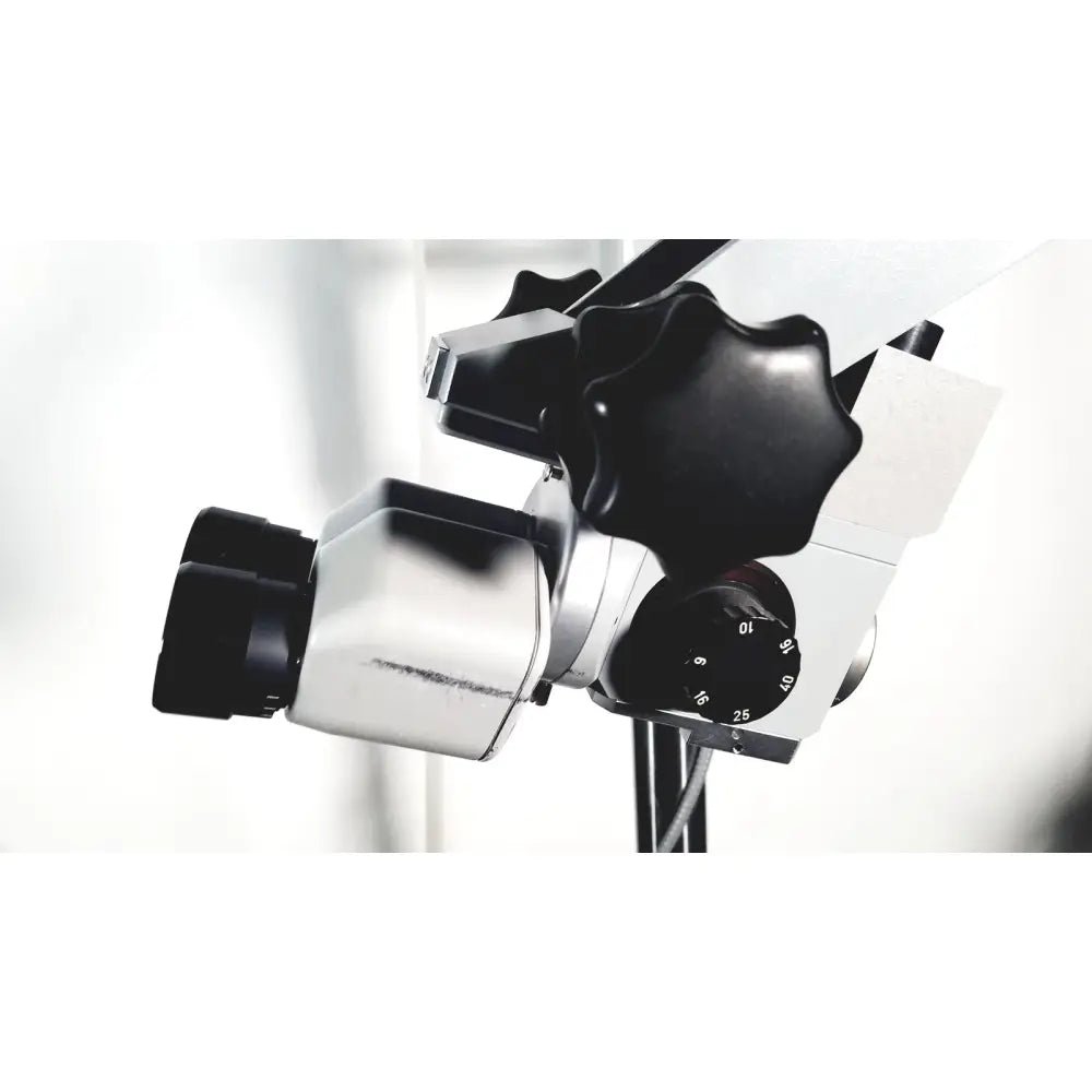 Black and silver zeiss opmi-1 prescott’s mark ii dental operating microscope with adjustable knobs and floor stand