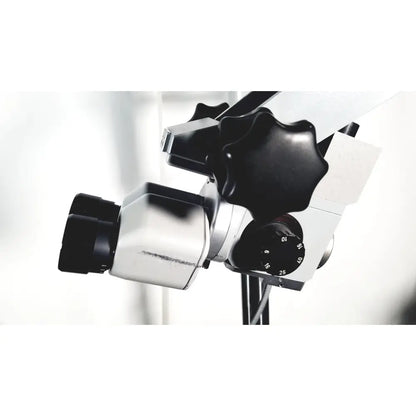 Black and silver zeiss opmi-1 prescott’s mark ii dental operating microscope with adjustable knobs and floor stand